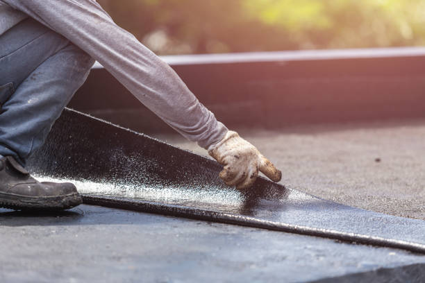 Professional Waterproofing technician working in Syosset, NY